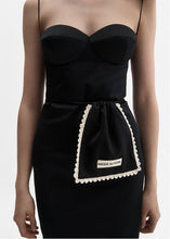 Load image into Gallery viewer, Silk pouch with crochet trim in black
