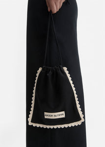 Silk pouch with crochet trim in black