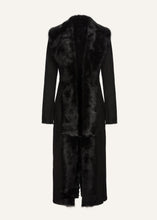 Load image into Gallery viewer, Longline shearling coat in black
