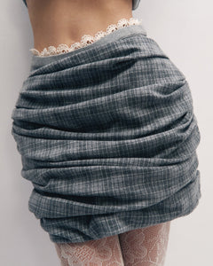 Hip pad draped skirt in grey check