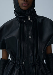 Elasticized leather peplum jacket in black