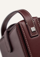 Load image into Gallery viewer, Apolonia bag in burgundy leather with flower charm
