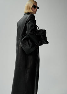 Double-breasted leather coat in black