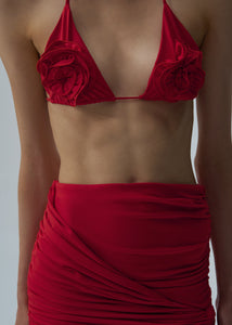 Draped mini swim skirt in red