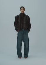 Load and play video in Gallery viewer, Belted loose leg denim in vintage blue
